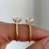 Additional product photograph showing the ring design, setting and band.