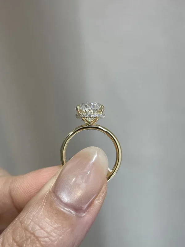 Additional product photograph showing the ring design, setting and band.