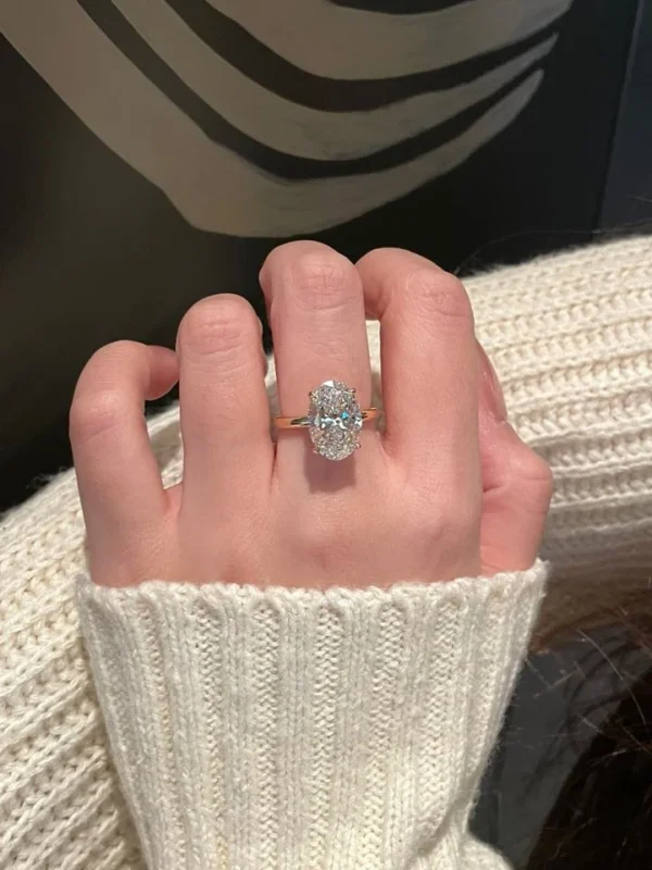 Additional product photograph showing the ring design, setting and band.