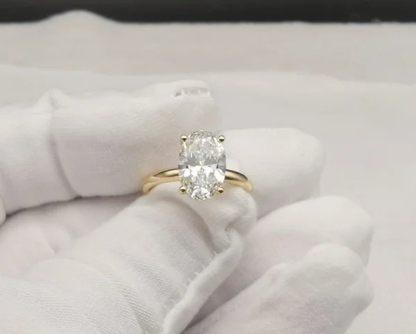 Additional product photograph showing the ring design, setting and band.