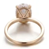 Additional product photograph showing the ring design, setting and band.