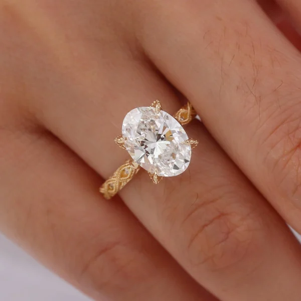 Jewelry design reference showing the ring setting and band. Oval Side-Stone Engagement Ring Design.