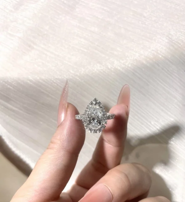 Additional product photograph showing the ring design, setting and band.