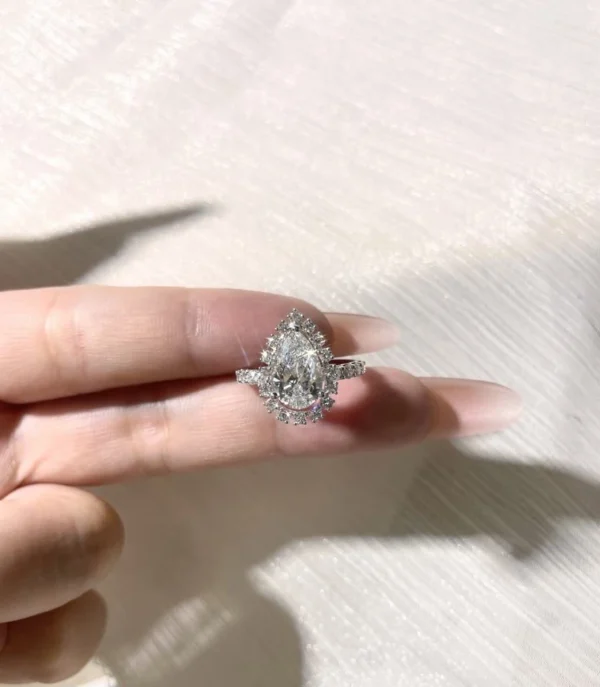 Additional product photograph showing the ring design, setting and band.