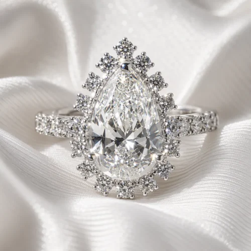 Pear Lab-Grown Diamond Halo Ring in 18K Solid Gold shown in the product photograph.
