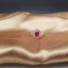 Additional product photograph showing the ring design, setting and band.