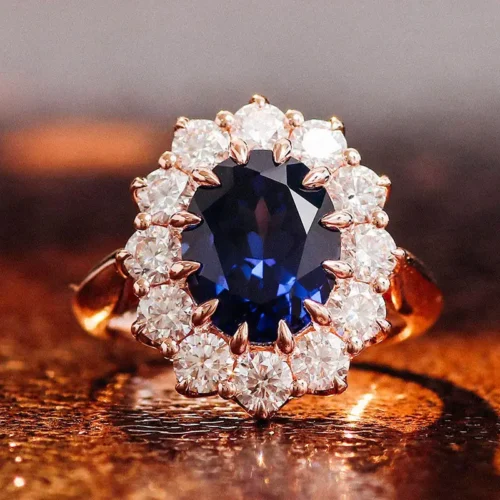 Oval Lab-Grown Sapphire Floral Ring in 14K Solid Gold shown in the product photograph.