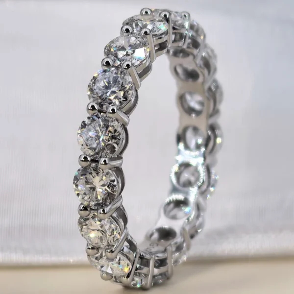 Additional product photograph showing the ring design, setting and band.