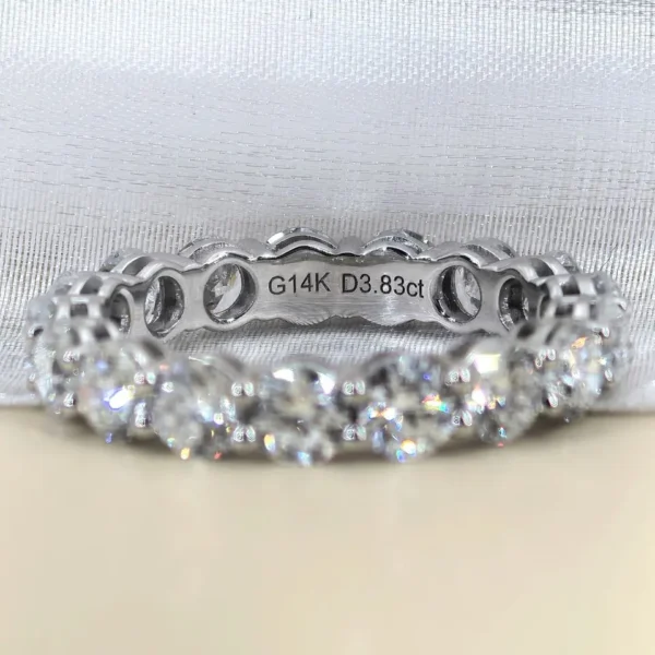 Additional product photograph showing the ring design, setting and band.