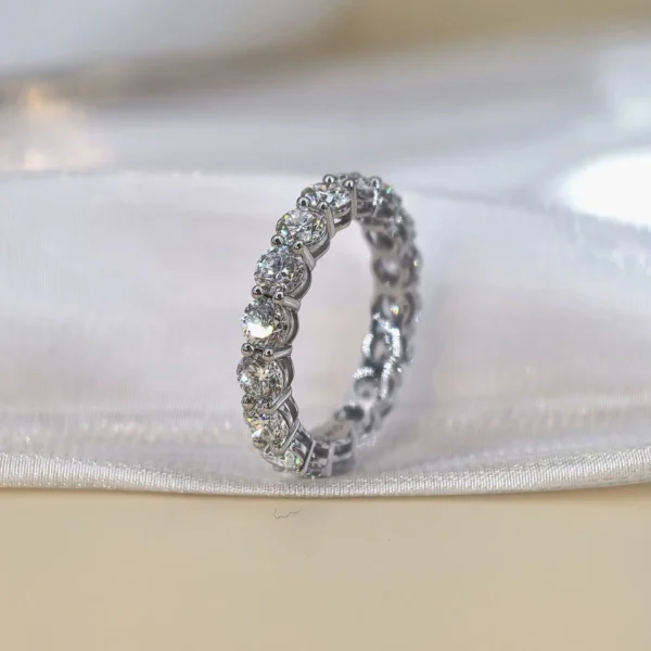 Oval Moissanite Eternity Ring in 925 Sterling Silver shown in the product photograph.