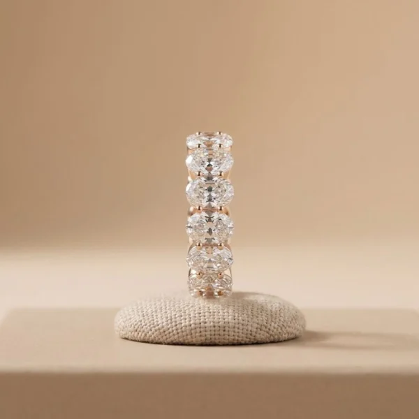 Oval Moissanite Eternity Ring in 925 Sterling Silver shown in the product photograph.
