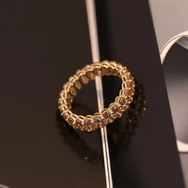 Additional product photograph showing the ring design, setting and band.
