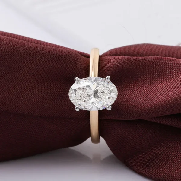 Oval Moissanite Solitaire Ring in Gold shown in the product photograph.