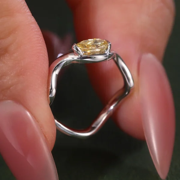 Additional product photograph showing the ring design, setting and band.