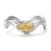 Additional product photograph showing the ring design, setting and band.