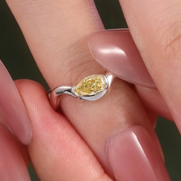 Pear Lab-Grown Diamond Bezel-Set Ring in 14K Solid Gold shown in the product photograph.
