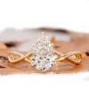 Product photograph showing the pear halo ring.
