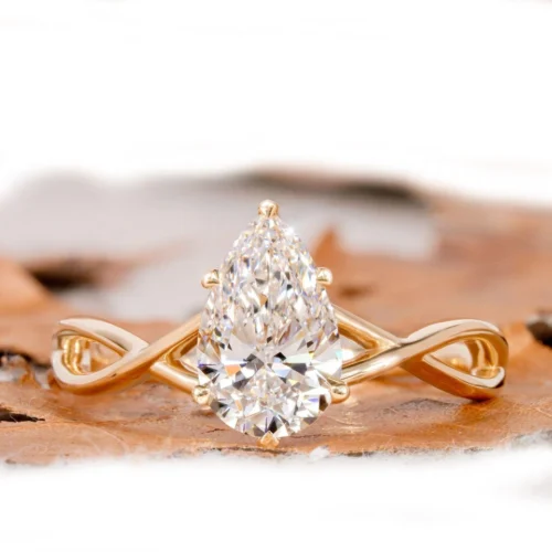 Product photograph showing the pear halo ring.