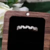 Additional product photograph showing the ring design, setting and band.