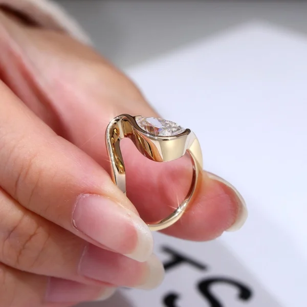 Additional product photograph showing the ring design, setting and band.
