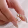 Additional product photograph showing the ring design, setting and band.