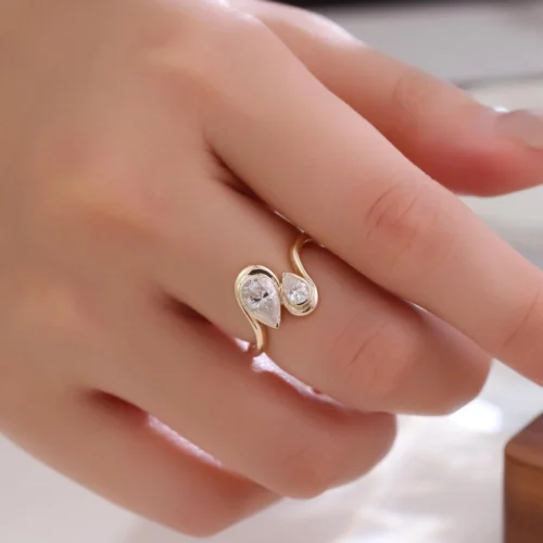 Product photograph showing the mixed-cut two-stone ring.