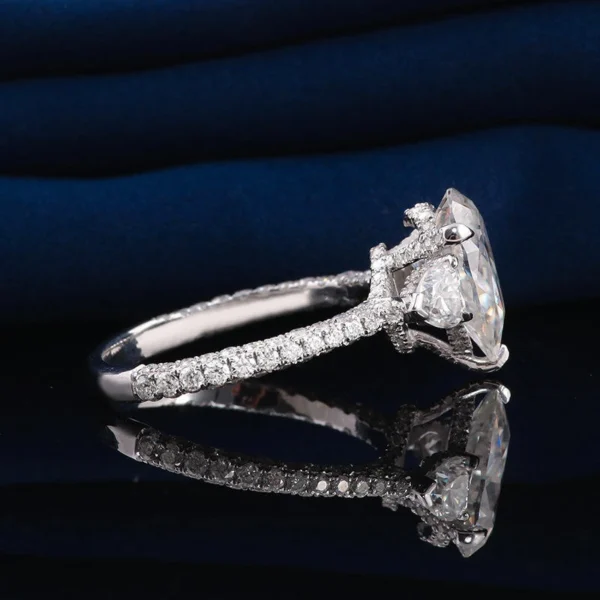 Additional product photograph showing the ring design, setting and band.