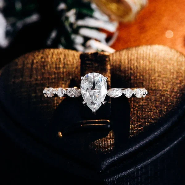 Additional product photograph showing the ring design, setting and band.