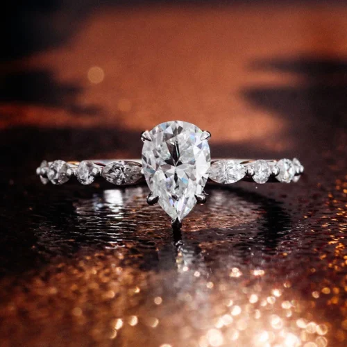 Pear Moissanite Ring in 18K Gold shown in the product photograph.