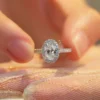 Product photograph showing the oval halo ring.