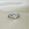 Additional product photograph showing the ring design, setting and band.