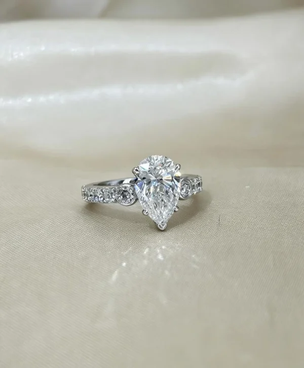 Additional product photograph showing the ring design, setting and band.