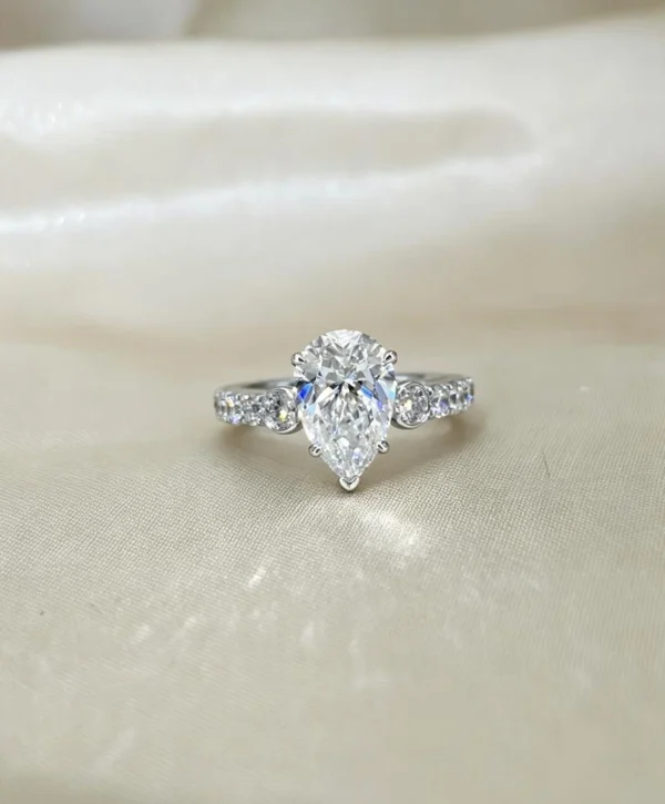 Additional product photograph showing the ring design, setting and band.
