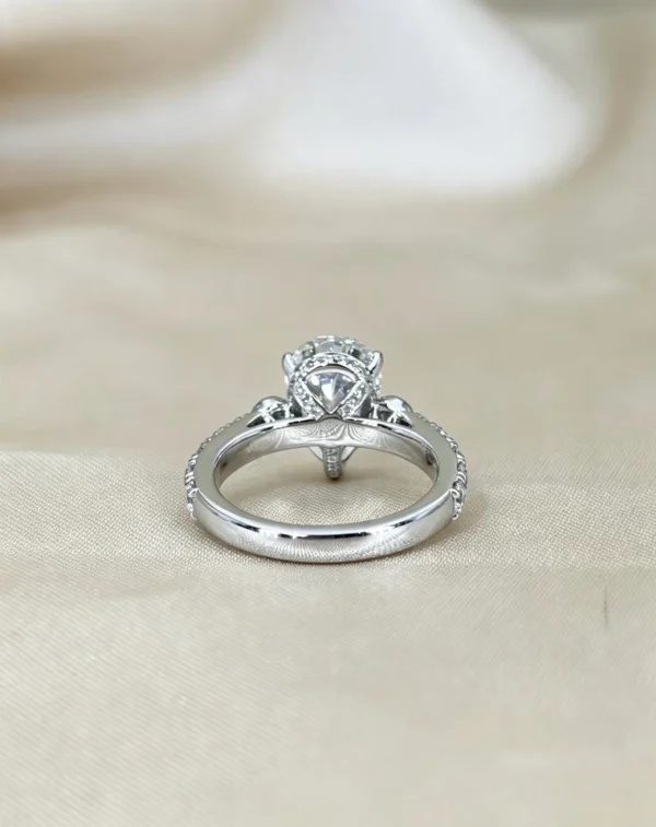 Additional product photograph showing the ring design, setting and band.
