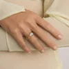 Additional product photograph showing the ring design, setting and band.