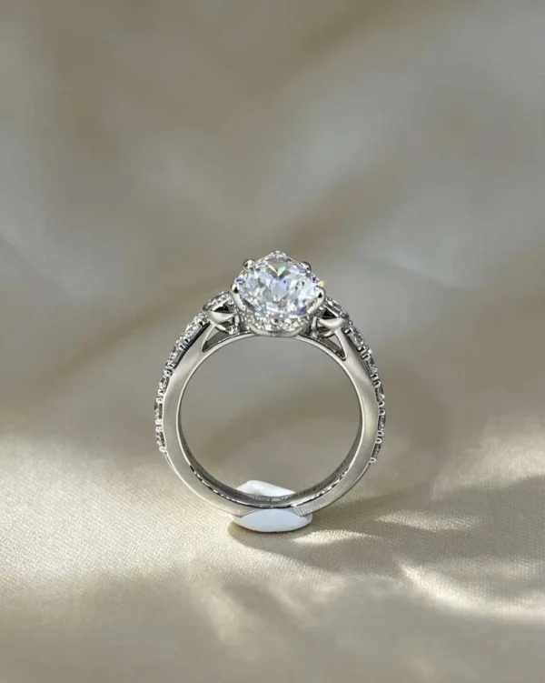 Additional product photograph showing the ring design, setting and band.