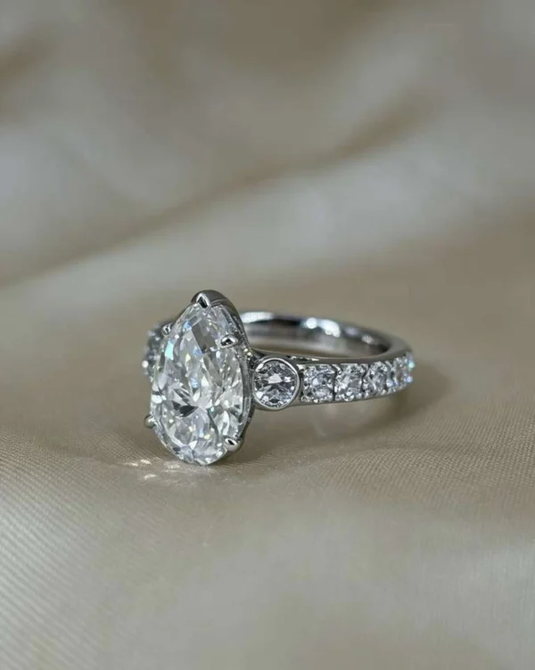 Additional product photograph showing the ring design, setting and band.