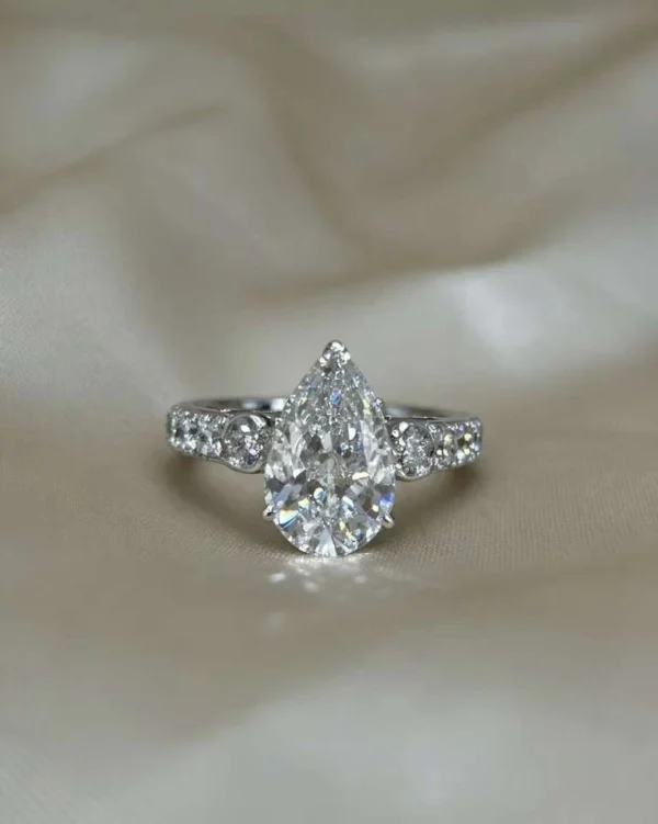 Pear Moissanite Ring in Gold shown in the product photograph.