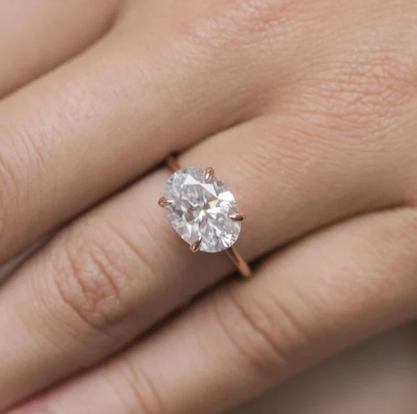 Product photograph showing the oval solitaire ring.