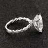 Additional product photograph showing the ring design, setting and band.