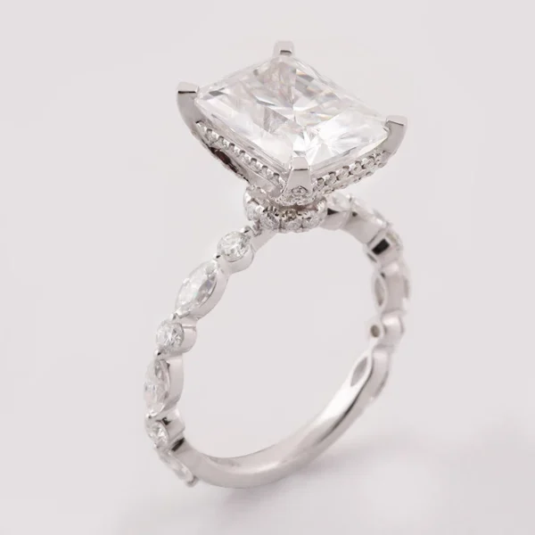 Additional product photograph showing the ring design, setting and band.