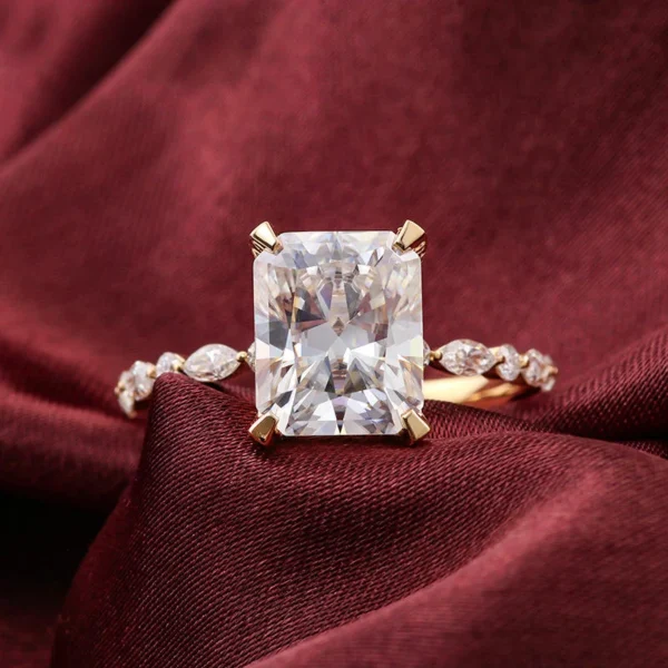 Product photograph showing the radiant side-stone ring.