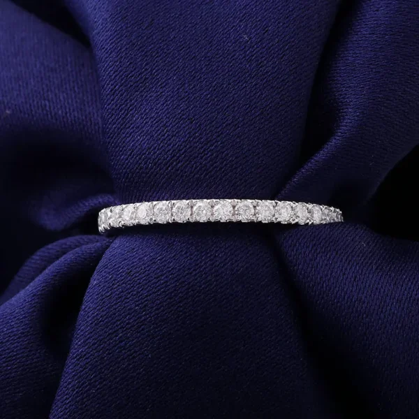 Additional product photograph showing the ring design, setting and band.