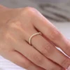 Round Gemstone Eternity Ring in Gold shown in the product photograph.