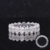 Round Gemstone Eternity Ring in Gold shown in the product photograph.