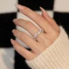 Additional product photograph showing the ring design, setting and band.