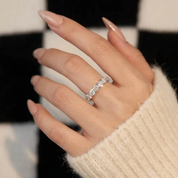 Additional product photograph showing the ring design, setting and band.