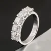 Product photograph showing the half-eternity ring.
