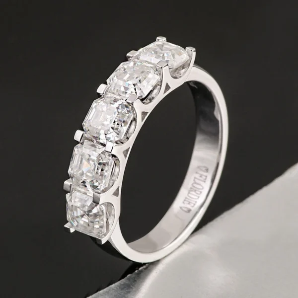 Product photograph showing the half-eternity ring.