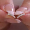 Additional product photograph showing the ring design, setting and band.